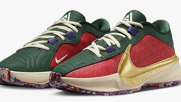 Side view of Giannis Antetokounmpo's green, red, and gold Nike shoes.